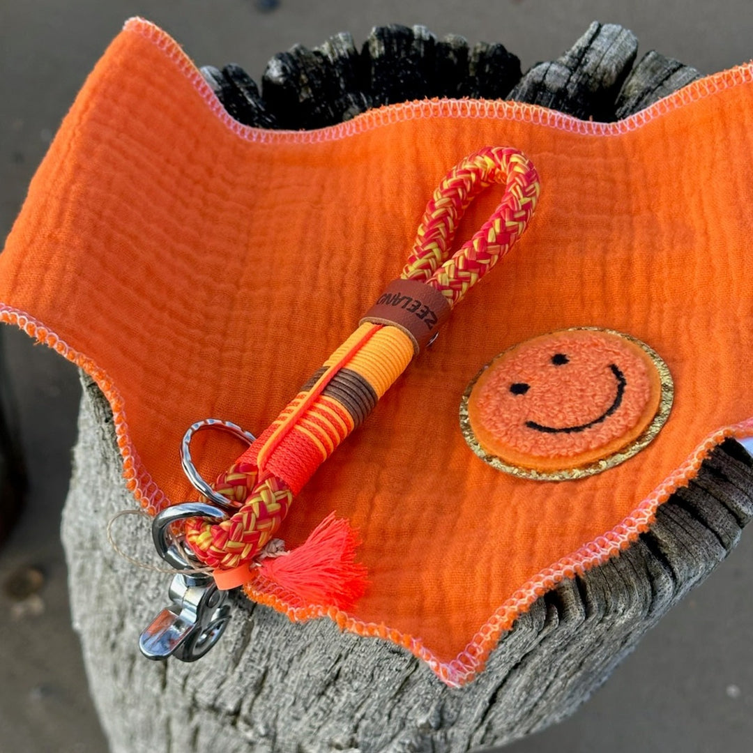 Porte-clés chien zélandais Happy Orange